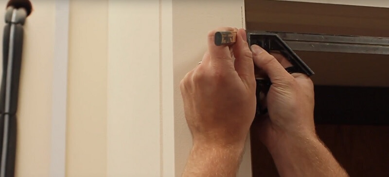 measuring a door lining for fitting architrave